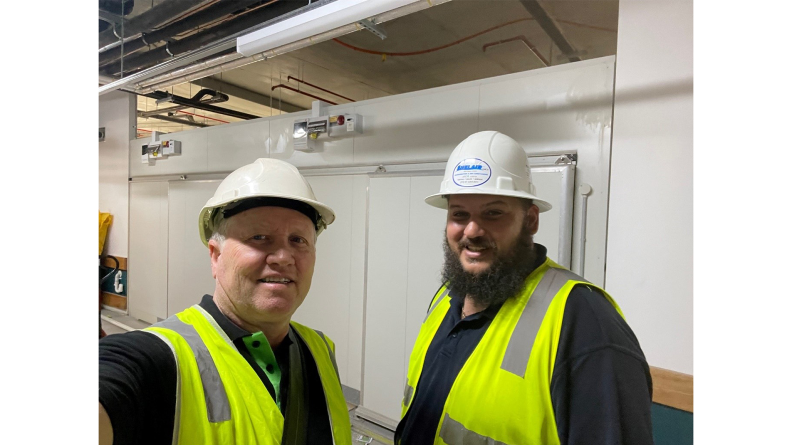 Project partners Glen Stubberfield (BITZER) and Antonis Condoleon (Shelair) on site