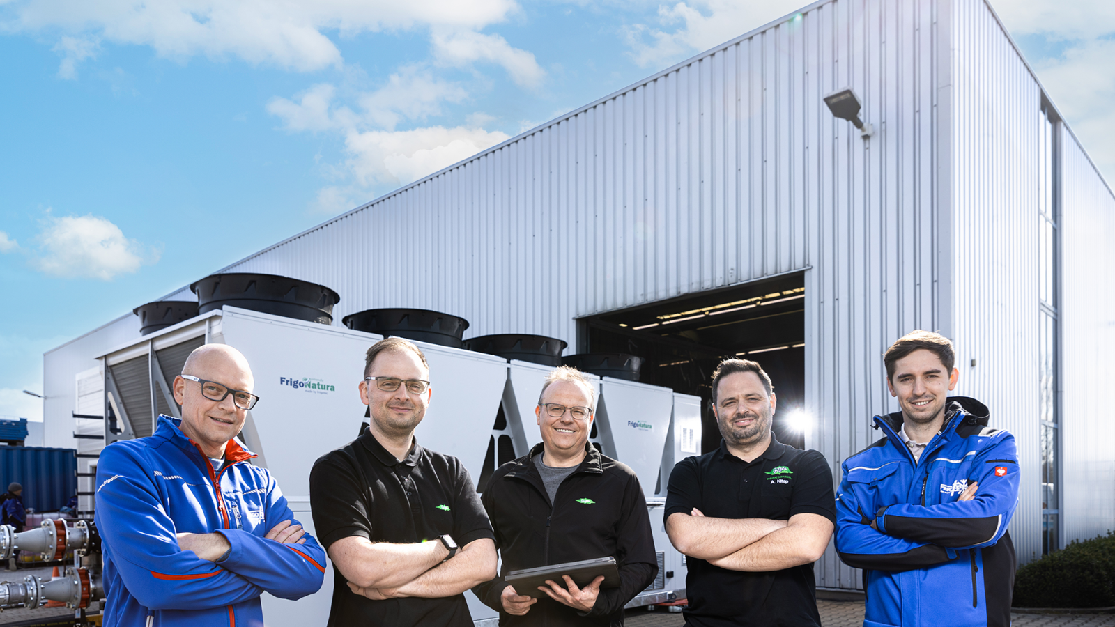 Group picture of five men. Employees of BITZER and FRIGOTEC.