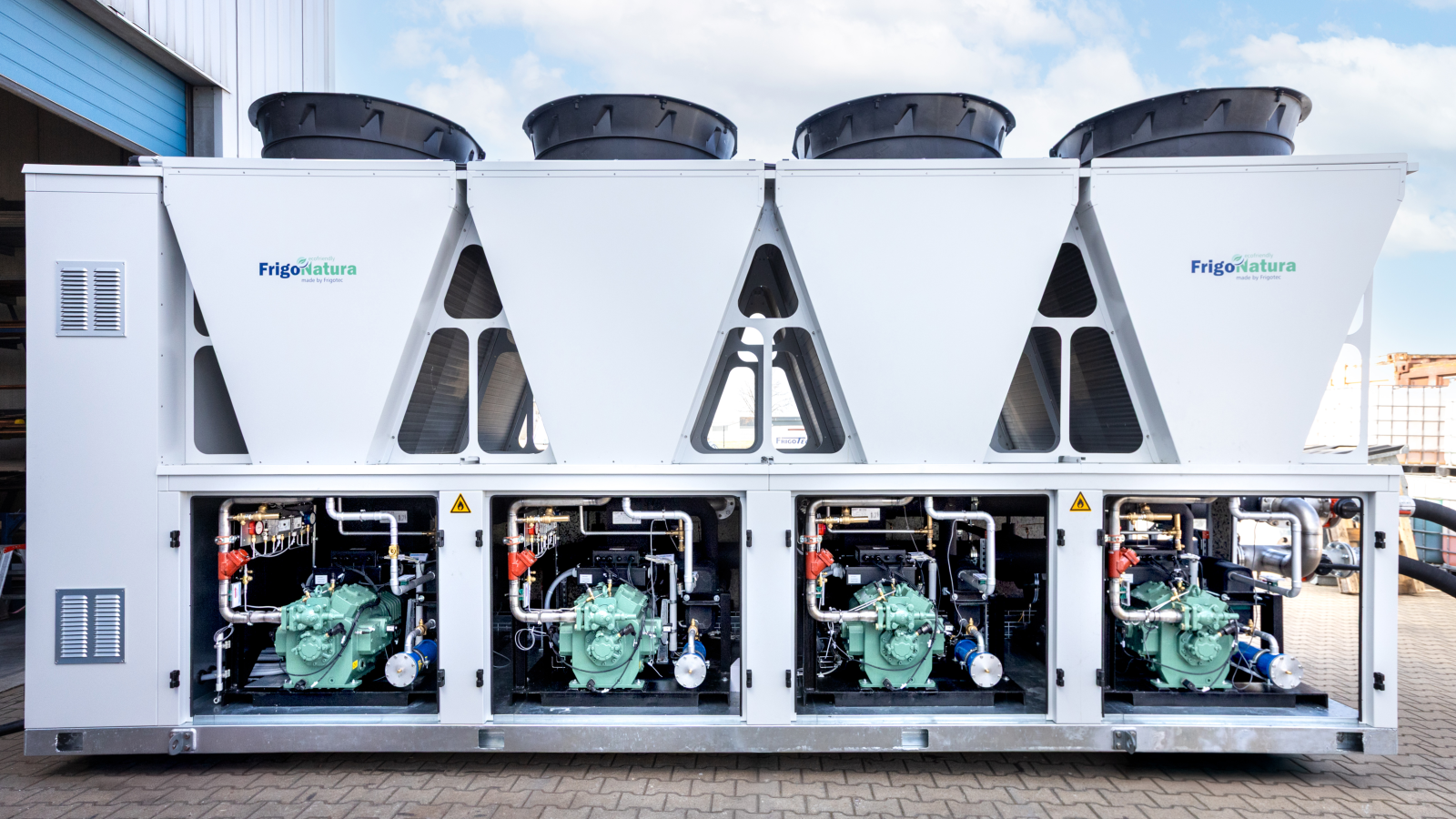 Large propane liquid chiller in open state with four reciprocating compressors from BITZER.