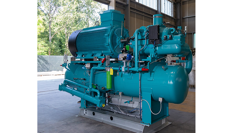 Zudek compression unit equipped with an open-drive screw compressor of the OS.A105 series from BITZER, completed with an electric motor, separator, oil cooler, and electrical panel