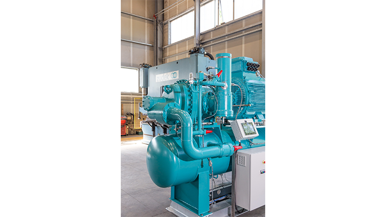 Zudek compression unit equipped with an open-drive screw compressor of the OS.A105 series from BITZER, completed with an electric motor, separator, oil cooler, and electrical panel