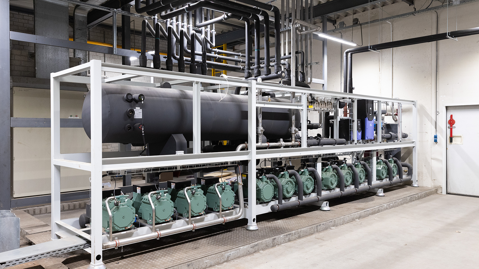 rack with several reciprocating compressors 